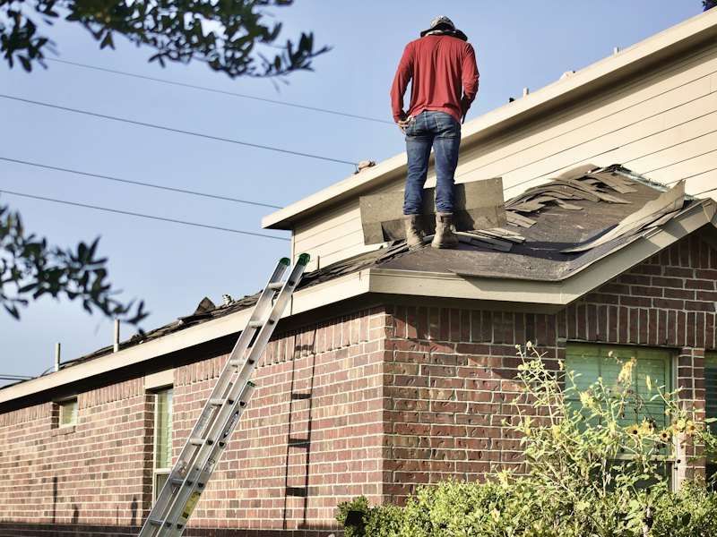 An old roof covering being stripped back
